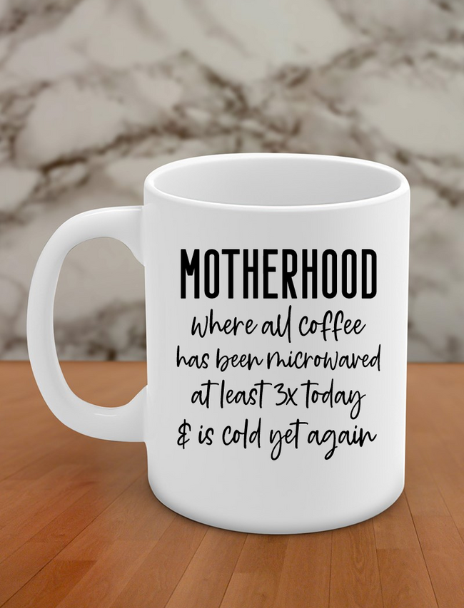 Motherhood where all coffee has been microwaved at least 3x today & is cold yet again Hover Image