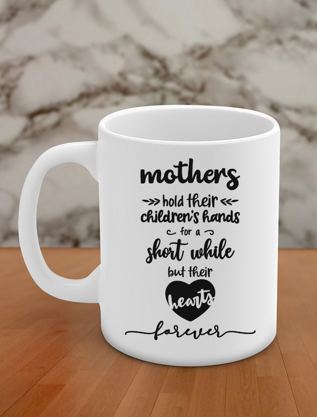 mothers hold their children's hands for a short while but their hearts forver Hover Image